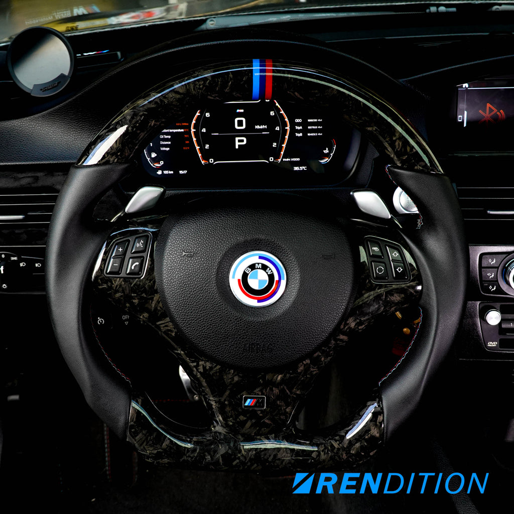 Custom BMW steering wheel in 2x2 weaved carbon, Nappa, and gloss finish