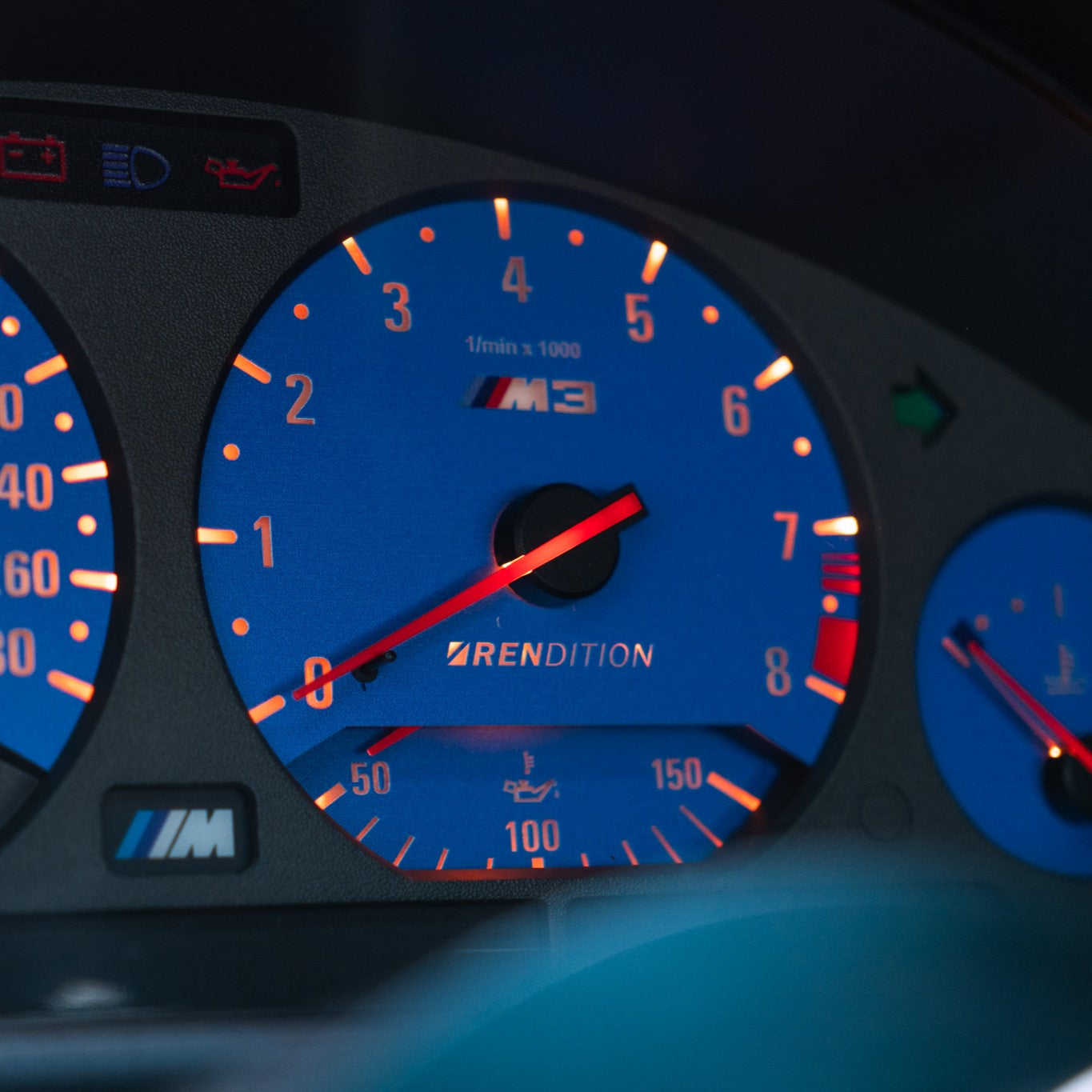 BMW E36 custom gauge face overlay installed in instrument cluster