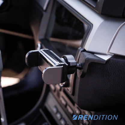 Close-up of CNC aluminum phone mount on E46 interior