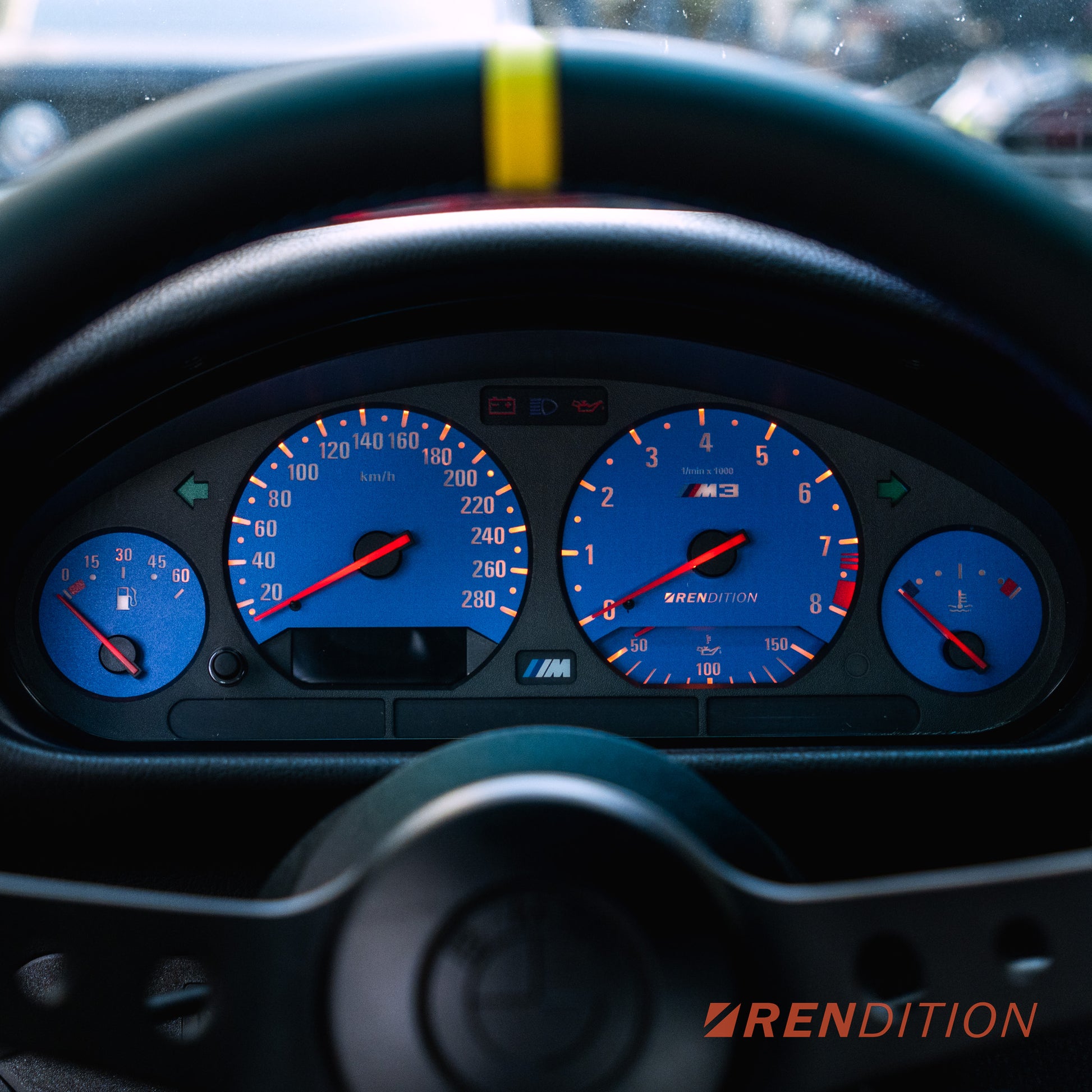 BMW E36 custom gauge face overlay installed in instrument cluster