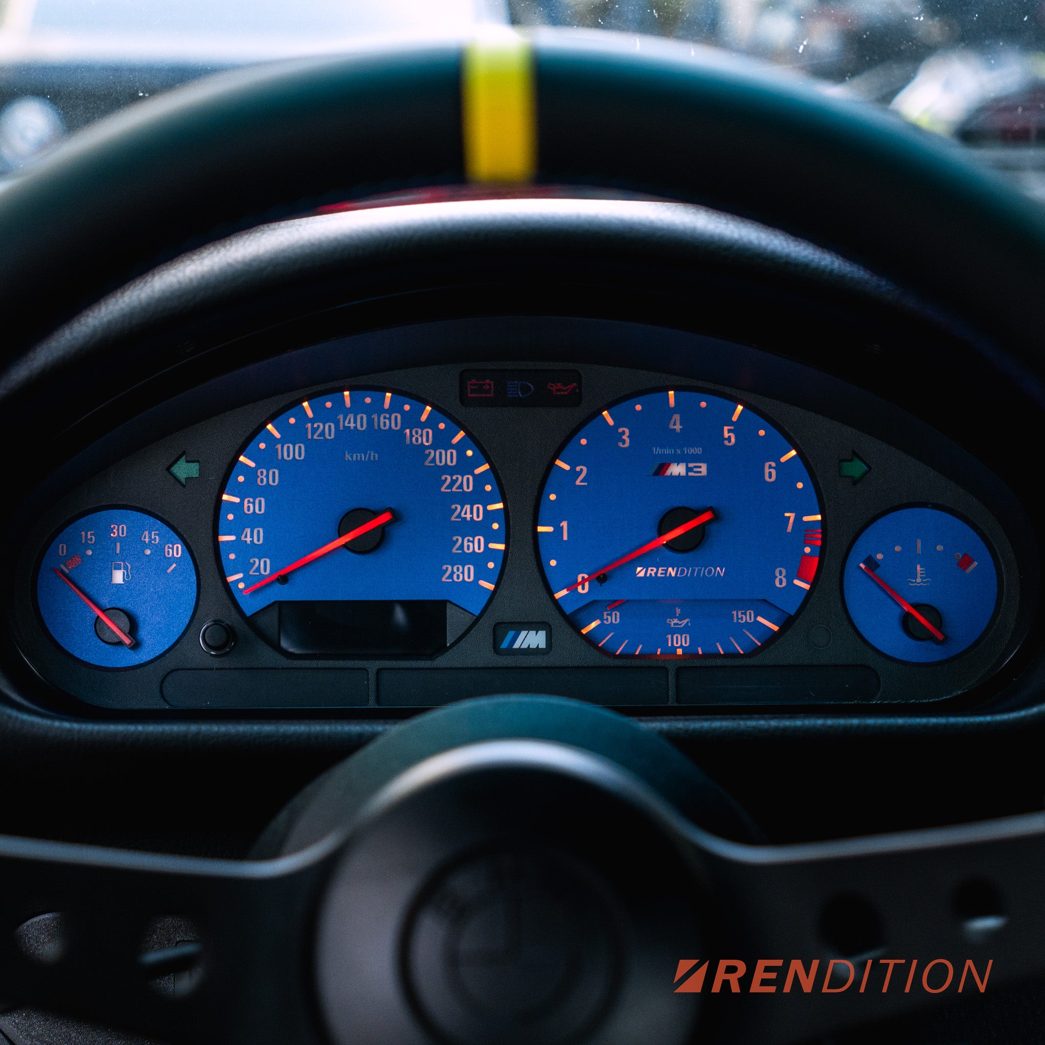 BMW E36 custom gauge face overlay installed in instrument cluster