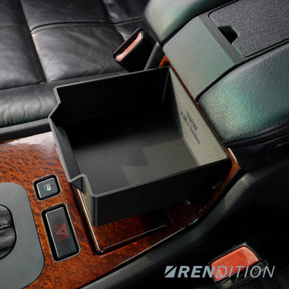 Car interior with a black storage compartment and leather seats, featuring the Rendition brand.