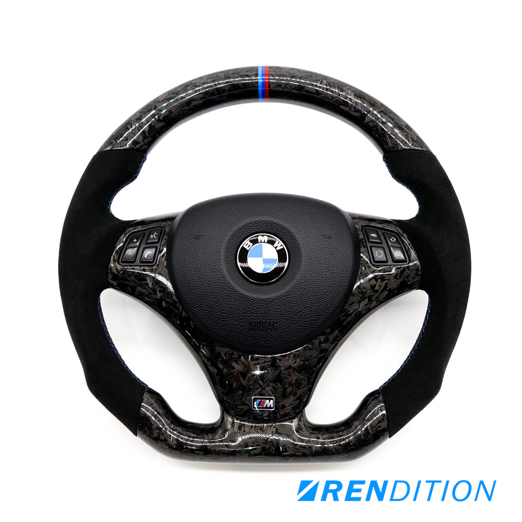 Custom BMW steering wheel in forged carbon, Alcantara, and gloss finish