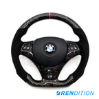 Custom BMW steering wheel in forged carbon, Alcantara, and gloss finish