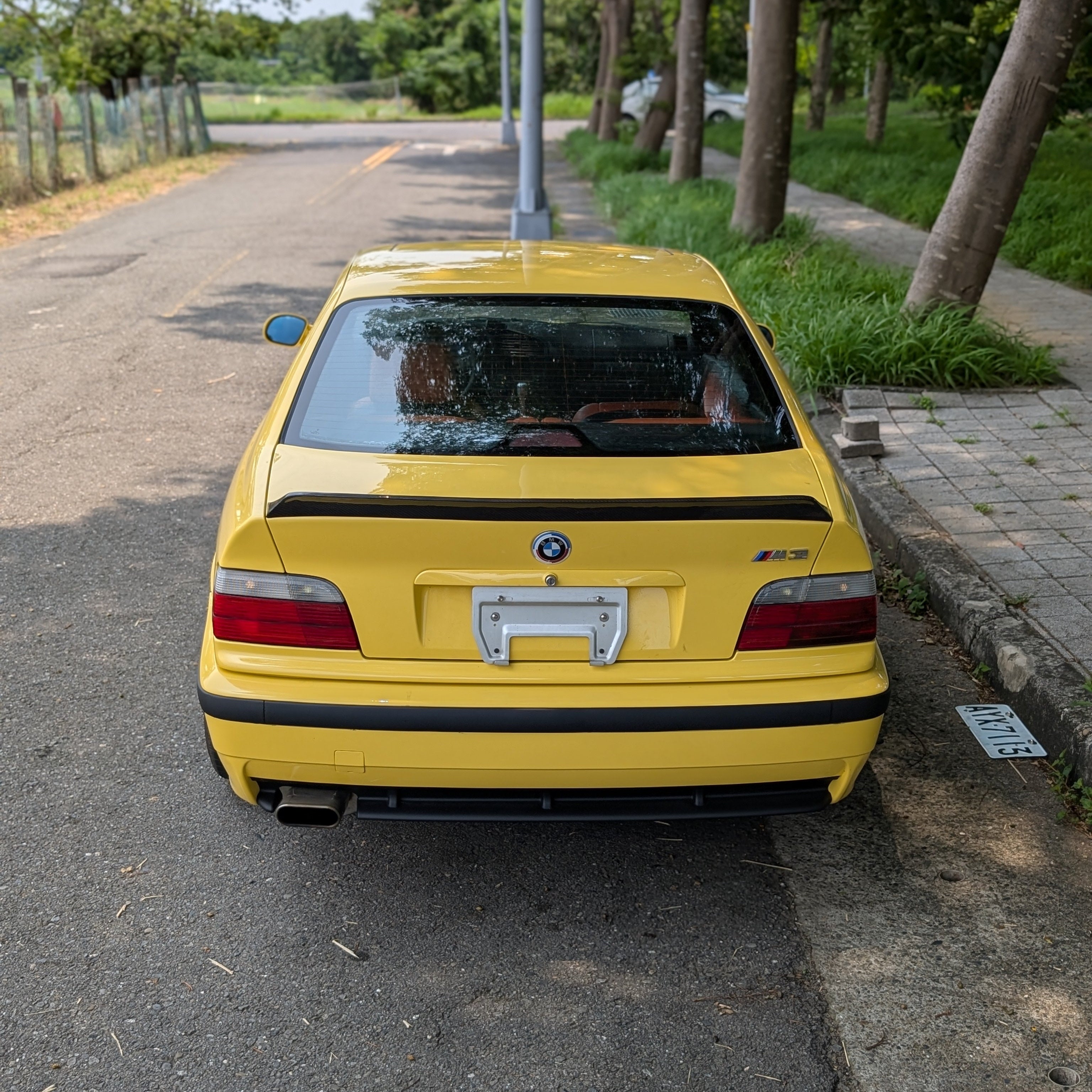 BMW E36 Ducktail Spoiler for Coupe, Sedan, and Convertible – Carbon and Kit Options