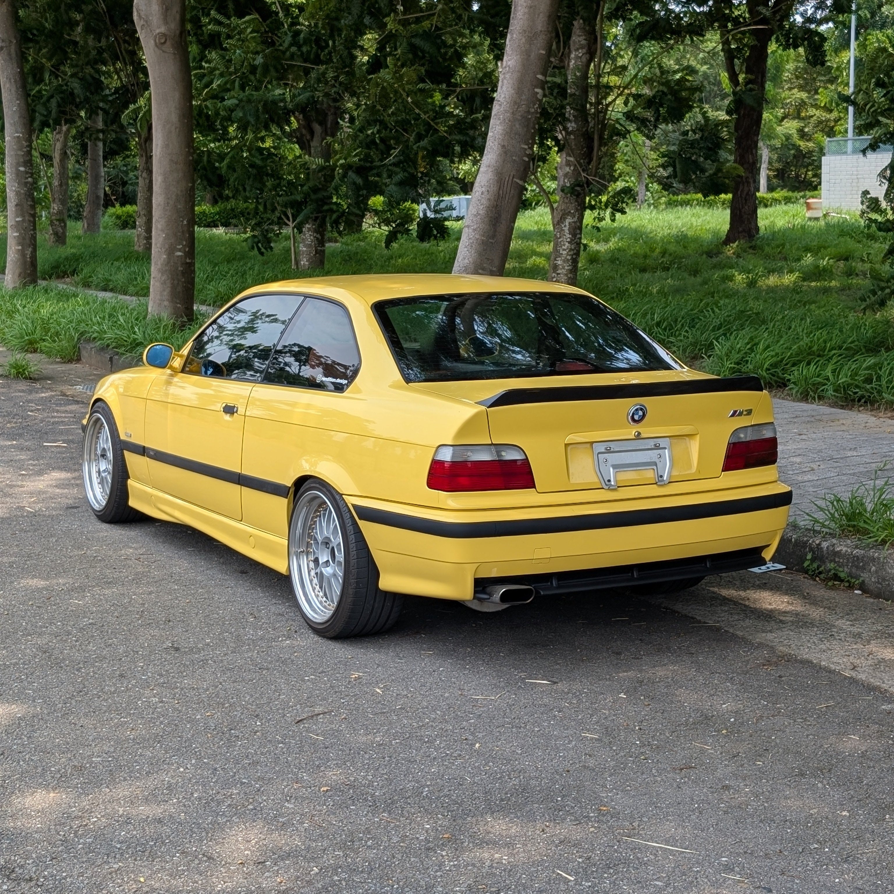  BMW E36 Ducktail Spoiler for Coupe, Sedan, and Convertible – Carbon and Kit Options