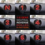 Digital display showing gear positions on a car dashboard.